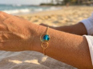 Bracelet anneaux en plaqué or perle en verre de Murano turquoise transparent